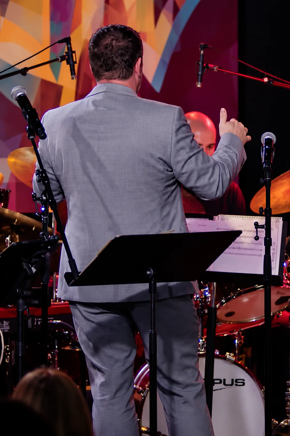 Chad Willis conducting from the bandstand — approved editorial image
