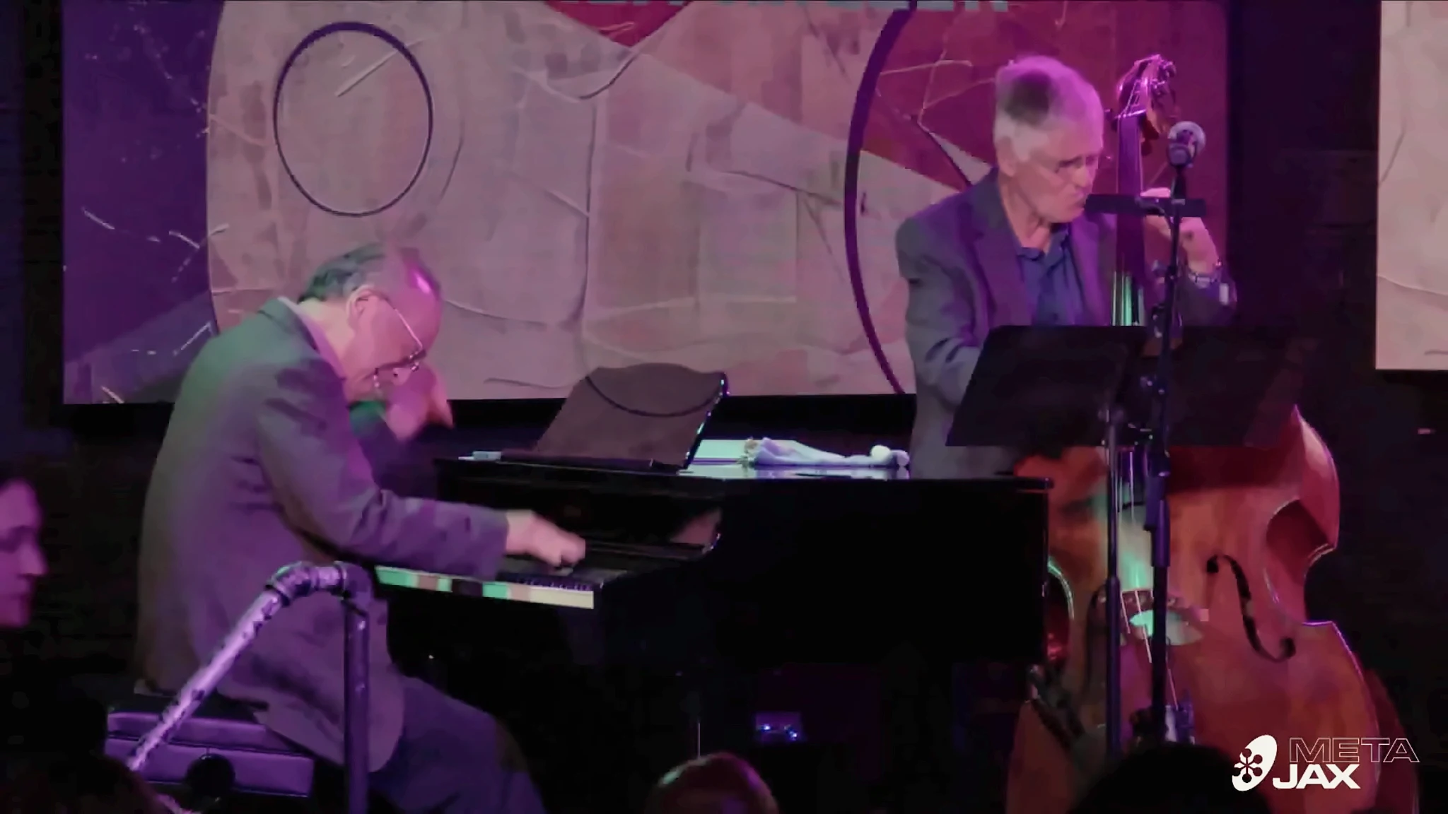 Ron Kobayashi playing piano alongside an upright bassist at Campus JAX